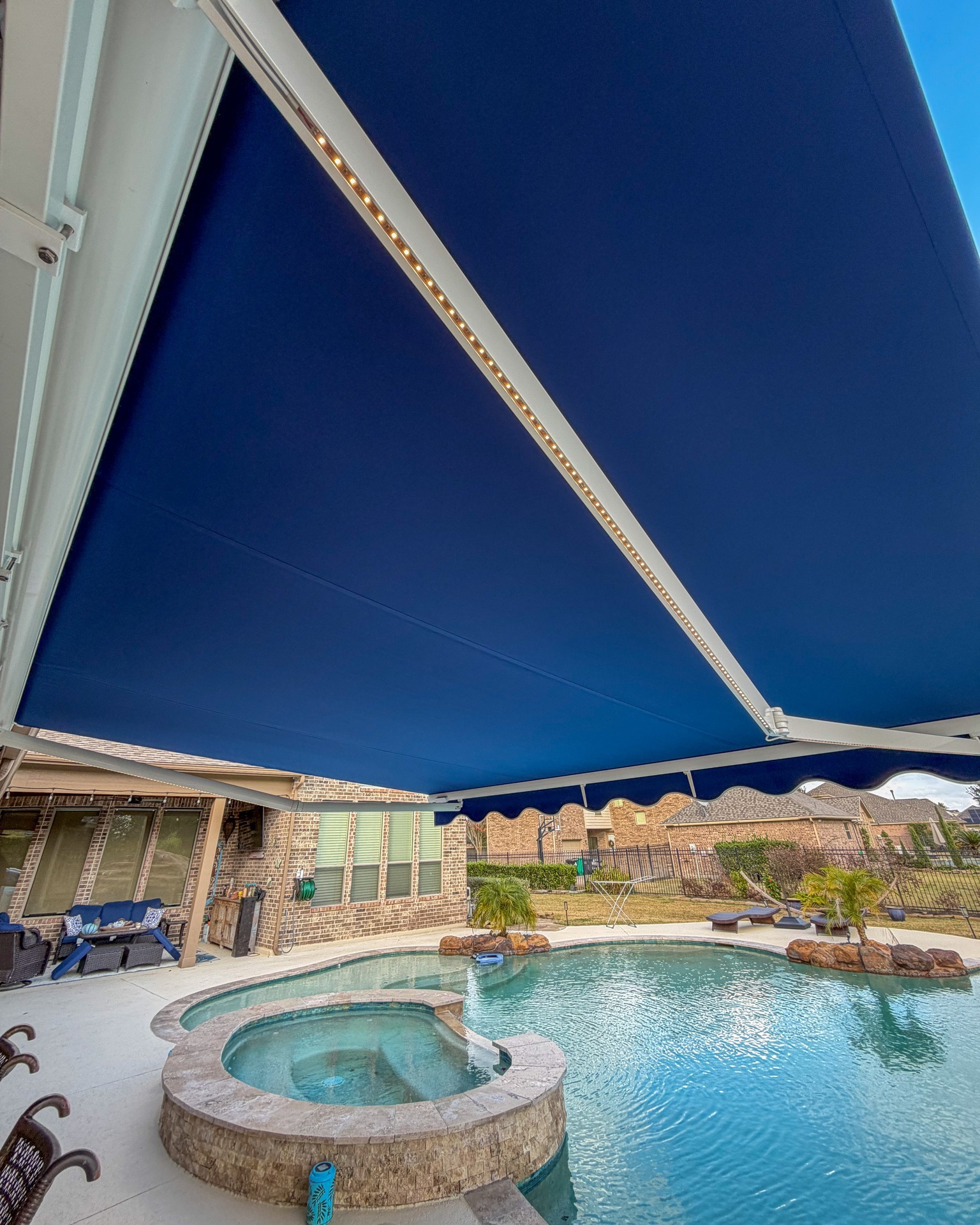 Pool Lounge Retractable Cover installed by Texan Glass in The Woodlands, TX